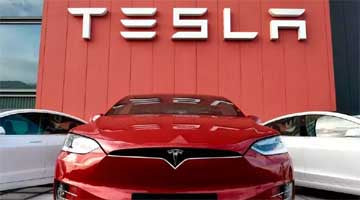 Tesla का मालिक कौन है और यह किस देश की कंपनी है?